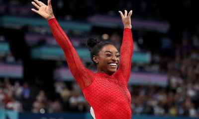 biles in red